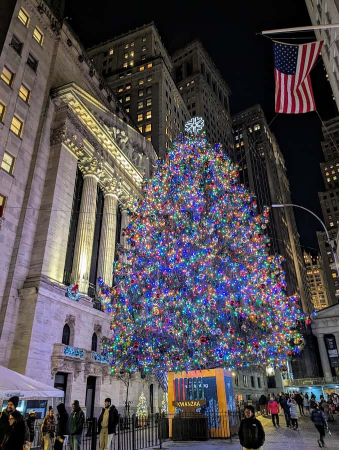 New York City: Guided Private Glass-Top Bus Tour at Night - Pier 17 and the Brooklyn Bridge after dark