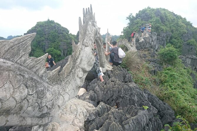 Ninh Binh Daily Tour All-Inclusive Bus, Guide, Lunch & Activities - Trang An by bamboo boat for two and a half hours
