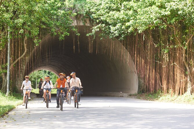 Ninh Binh Day Trip: Bai Dinh-Trang An-Mua Cave, Buffet, Boat, Bus - The guide and the group experience
