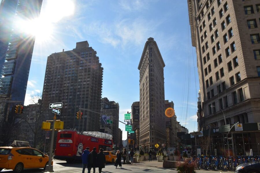 NYC: Guided Bus and Walking Tour with Staten Island Ferry - A moving tour through New York neighborhoods