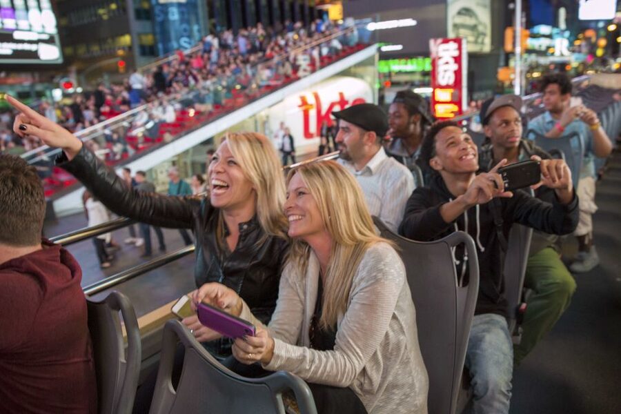 NYC: Sightseeing Night Tour by Open-Top Bus with Live Guide - Little Italy and the changing downtown streets