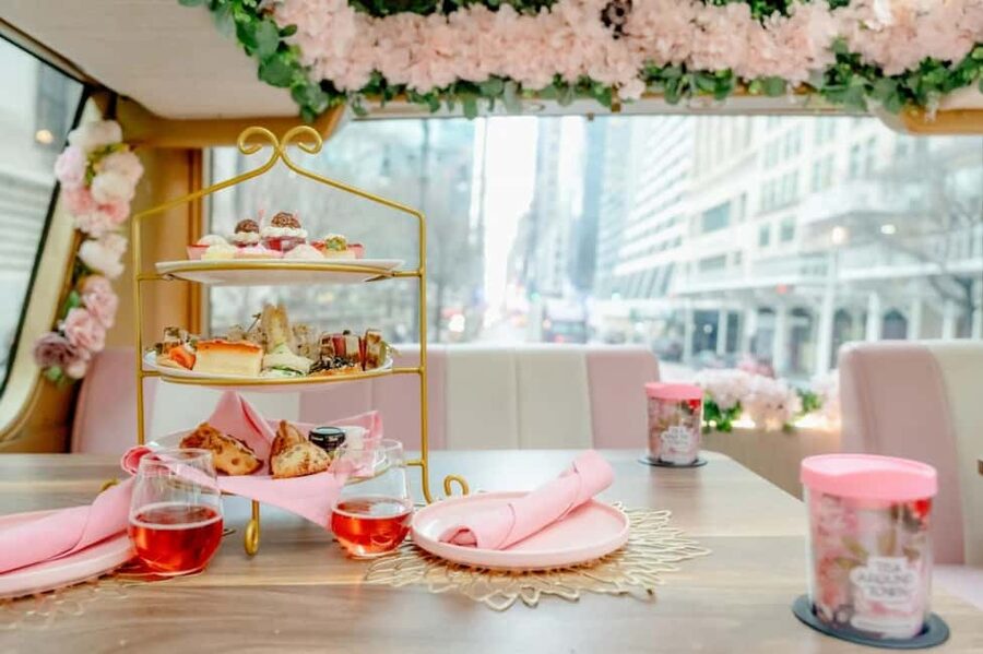 NYC: Tea Around Town Bus Tour with Live Entertainment - A pink tea room on Manhattan streets