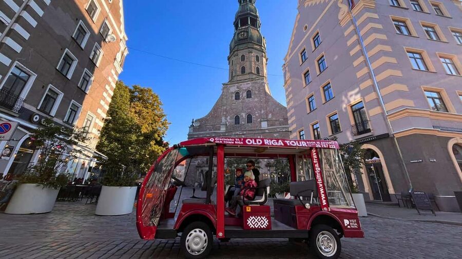 Old Riga Heated E-Bus Tour with Audio Guide & Mulled Wine - What the 30-minute ride is really for
