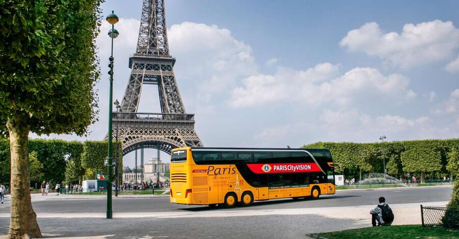 Paris: Audio-Guided Bus Tour & Seine River Cruise - The Seine cruise near the Eiffel Tower