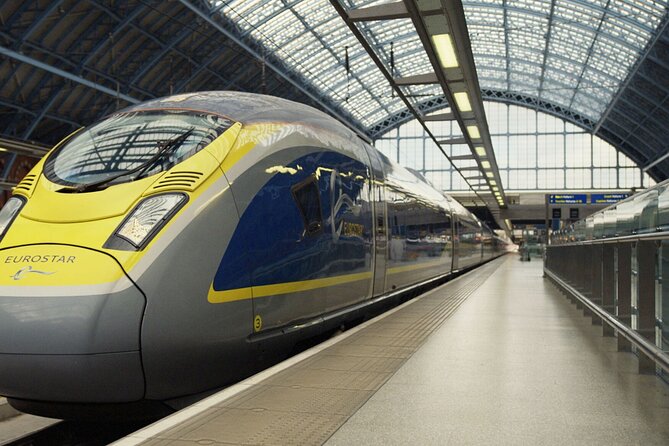 Paris by Rail with Sightseeing Bus and River Seine Lunch Cruise - Eiffel Tower photo stop