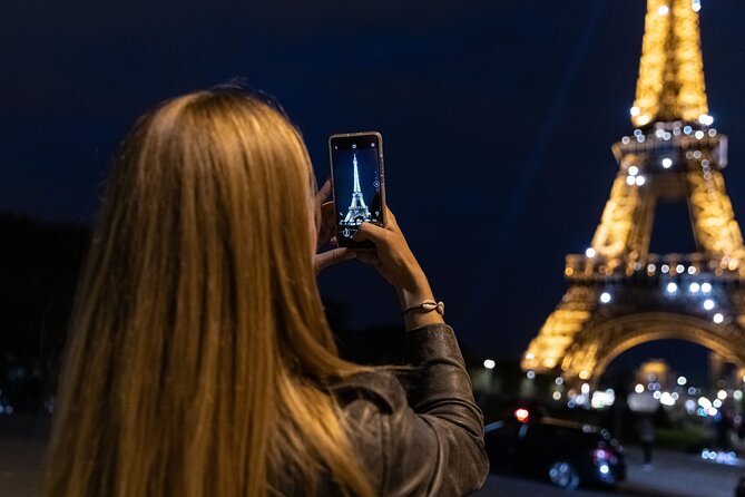 Paris Lights Evening Bus Tour with Eiffel Tower Summit Option - Rue de Rivoli and the Louvre from the road