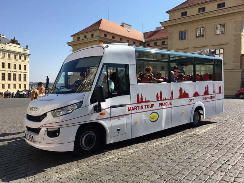 Prague: Bus and Boat Tour - Going from the castle area to the Vltava pier