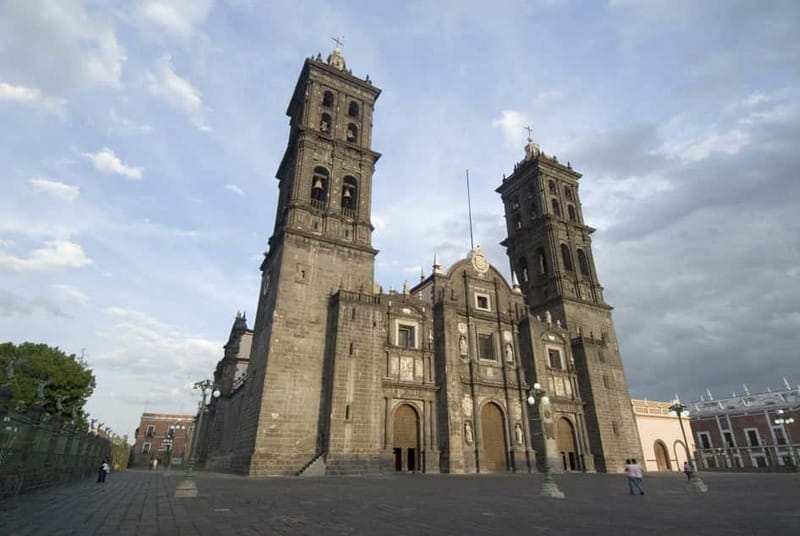 Puebla Sightseeing Tour by Double-Decker Tram - The Convention Center and May 5 forts add wider city context