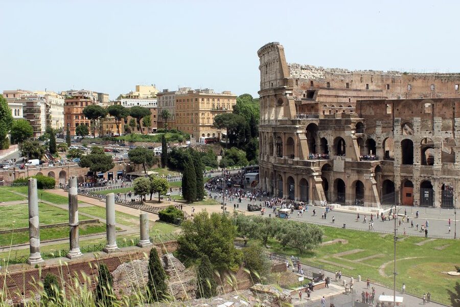 Rome: Hop-On Hop-Off Bus, Roman Forum & Colosseum Tour - Entering the Colosseum with a small group
