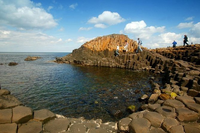 Shore Excursion: Giants Causeway Tour From Belfast Port (Extra Leg Room Bus) - Belfast’s murals add a serious final chapter