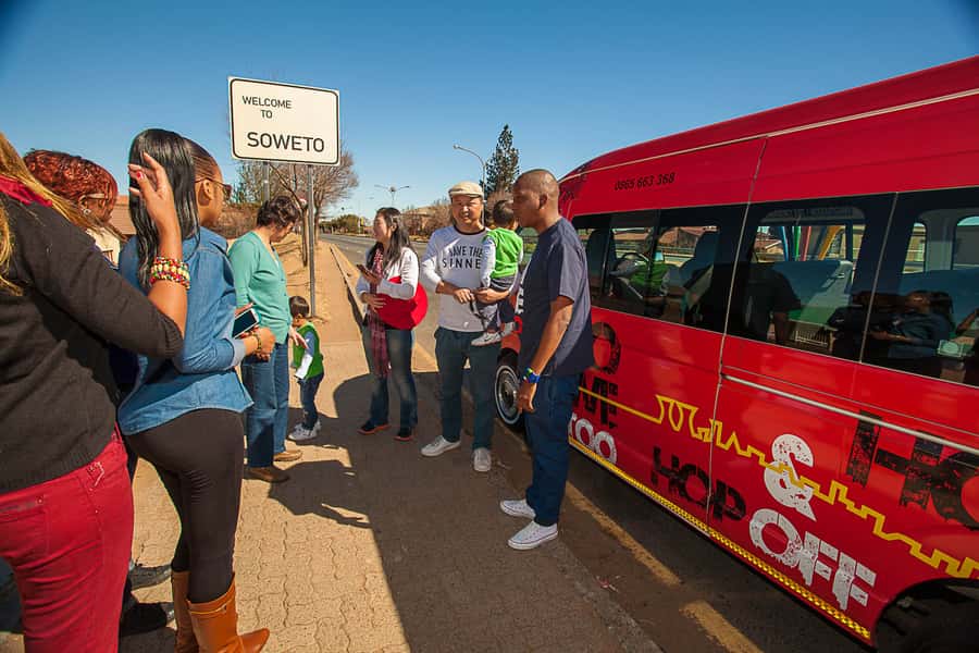 Soweto: Hop-On Hop-Off Bus, City Tour and Apartheid Museum - The handoff to Soweto at Gold Reef City