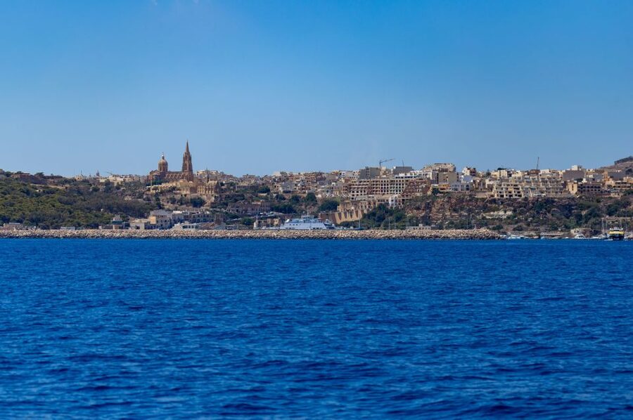 St. Paul's Bay: Blue Lagoon, Comino & Gozo with Bus Tour - The coastal return and cave views