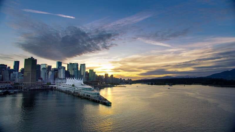 Sunset Bus Tour: Stanley Park & English Bay Photostops - Canada Place, Gastown, and downtown from the upper deck