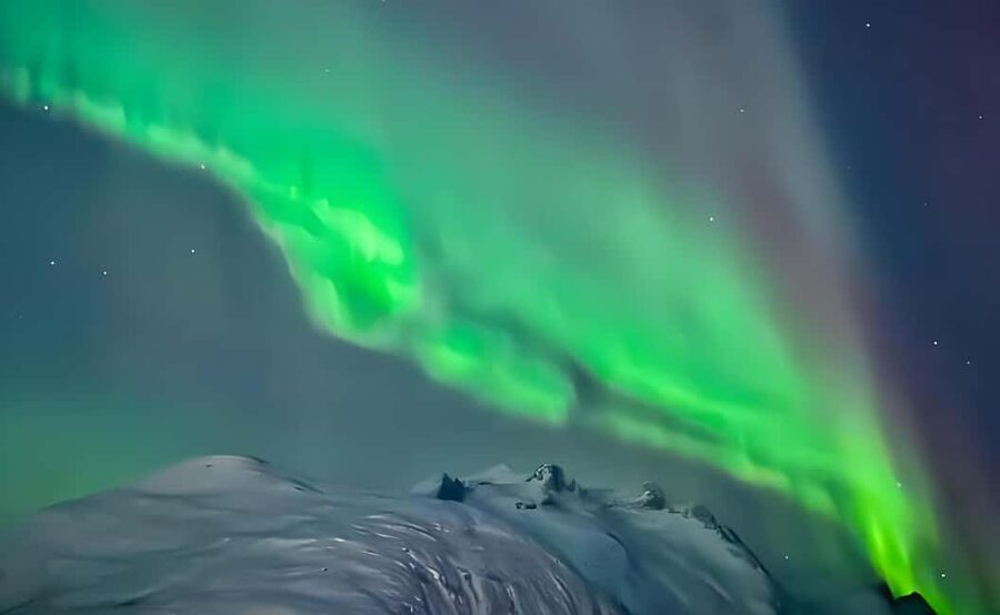 Tromsø: Northern Lights Bus Tour with Free Photography - The second stop: fire, food, and better odds