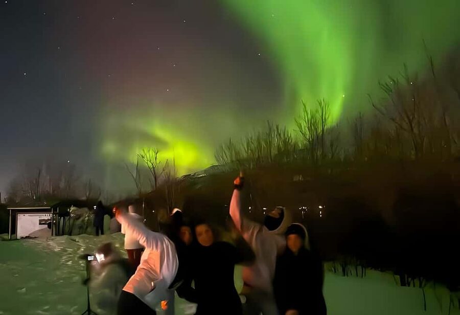 Tromsø: Northern Lights Bus Tour with Free Photography - The third stop: staying for the payoff