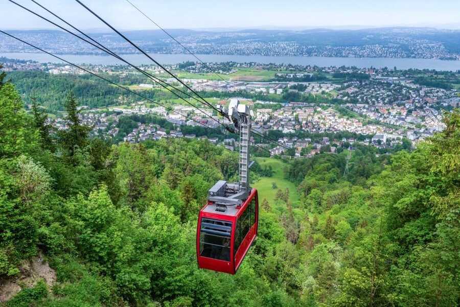Zurich: City Highlights Tour by Bus, Cable Car, and Ferry - Old Town churches, guild houses, and city streets