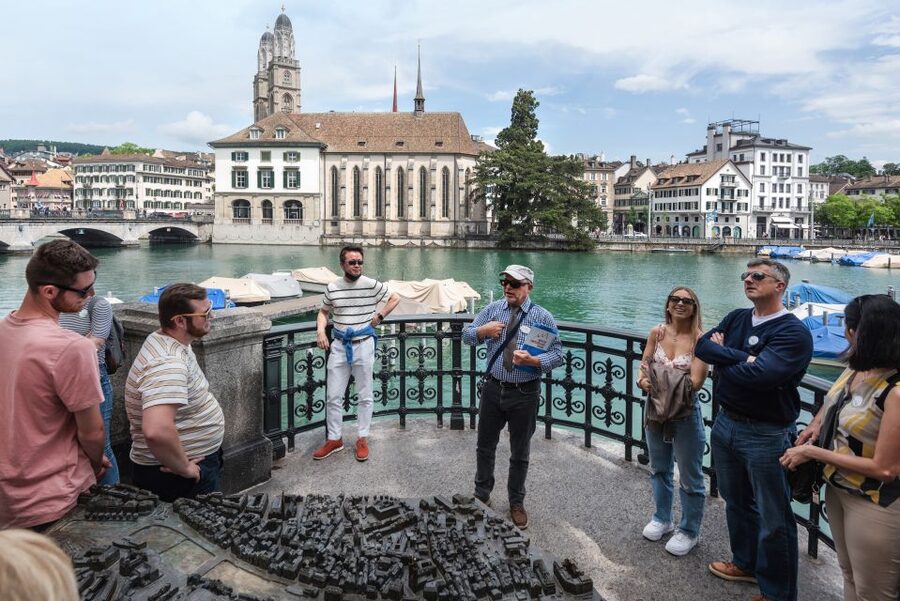 Zurich: City Highlights Tour by Bus, Cable Car, and Ferry - Crossing Lake Zurich by ferry with the coach